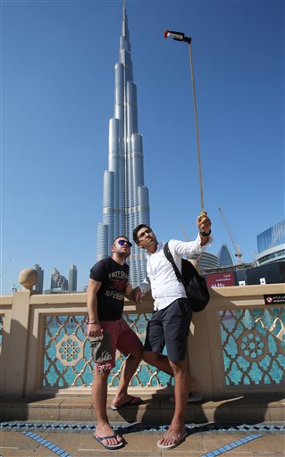 Mideast Emirates Selfie Sticks