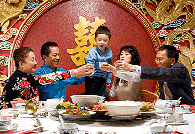 chinese-new-year-celebrations-decorations-home-family-table.gif